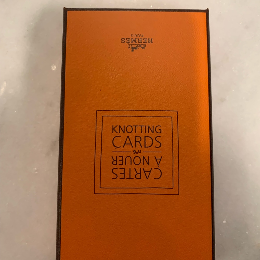 Hermes knotting cards.
